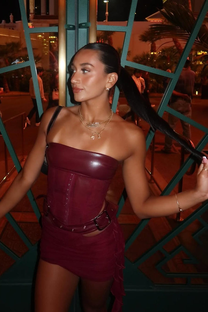 Eline – Strapless mini-jurk met leren corsetlook