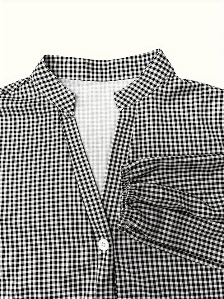 Maribel – Gestreepte midi-jurk met pofmouwen