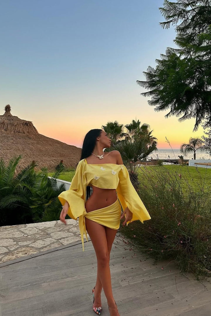 Maelisca – Asymmetric off-shoulder set with high slit