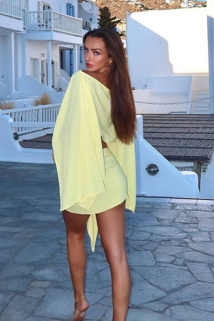 Maelisca – Asymmetric off-shoulder set with high slit